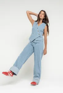 Blue and white striped vest and wide leg trousers set detail view showing relaxed fit.