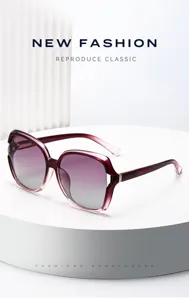 Lunettes de soleil oversize mode pour femme avec verres dégradés et monture rouge vin élégante.
