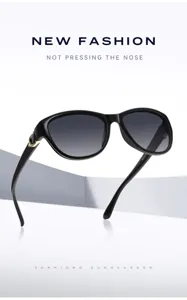 Lunettes de soleil polarisées pour femme élégantes avec monture noire et verres dégradés.