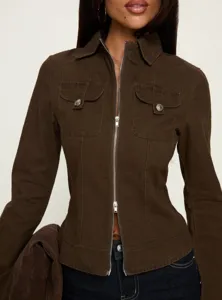 Close-up view of the brown retro slim utility jacket showing metal zipper and pockets.