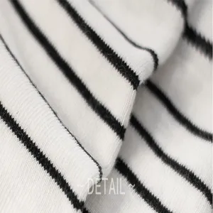 Cotton black and white striped socks fabric detail close up, trendy streetwear apparel.