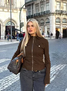 Detailed display of the retro brown cropped lapel zipper utility jacket featuring slim fit.