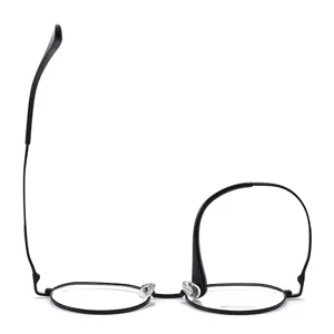 Lunettes optiques rondes en titane noir, monture légère en bêta-titane pour un usage quotidien.