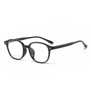 Montures de lunettes optiques rondes noires classiques en matériau TR pour un look élégant.