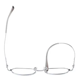 Monture de lunettes optique en titane élégante pour homme et femme design minimaliste argent.