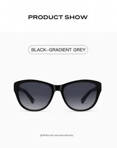 Lunettes de soleil élégantes noir dégradé gris pour femmes détail mode article vue