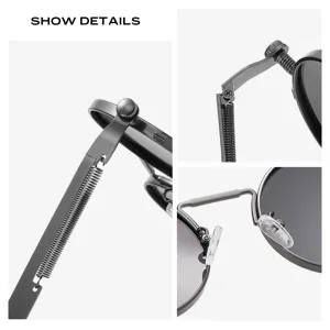 Lunettes de soleil homme rondes en métal vue de détail charnière à ressort et plaquettes de nez.