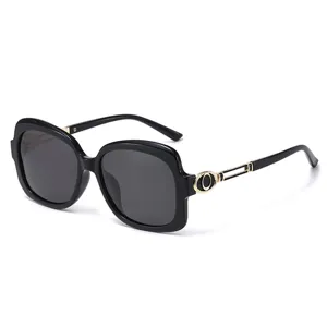 Lunettes de soleil noires surdimensionnees pour femmes details dores tendance protection UV