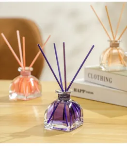 Flameless reed diffuser set with square glass bottle for home bedroom fragrance decor.
