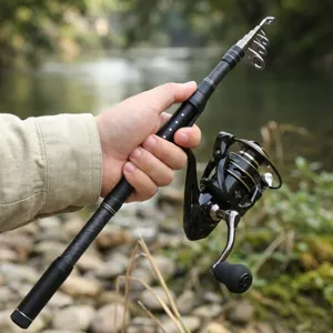 Carbon telescopic fishing rod and spinning reel combo set for bass and travel fishing.