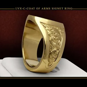 Detailed view of the gold-plated signet ring showcasing intricate engraved coat of arms patterns.
