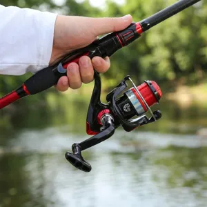 Detailed view of carbon fiber fishing rod and spinning reel combo for outdoor sea angling.