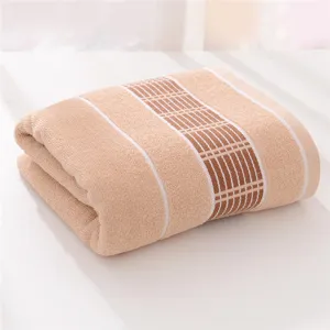 Wholesale pure cotton bath towel, solid color thickened soft absorbent home daily beach towel