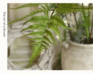 Artificial fern leaf close-up branch detail for floral arrangement home decor green plant