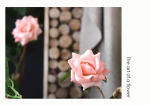 Artificial pink rose vine detail, realistic floral garland for home decor, wall decor.