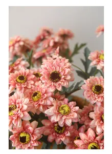 Vintage artificial sunflower detail, faux daisy flower arrangement for home table decor.