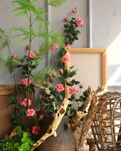 Artificial rose vine flower string climbing plant wall hanging home decor detail view