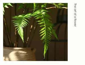 Artificial gold silk fern leaf green plant floral arrangement home landscape decor detail.