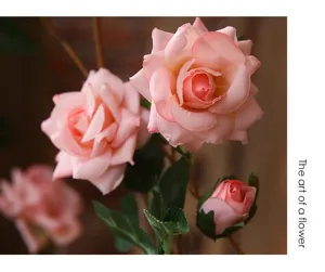 Detail view of artificial pink rose vine, perfect for romantic home and wall decoration.
