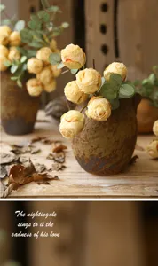 Vintage burnt-edge artificial rose flower arrangement for home living room decor and tabletop display.