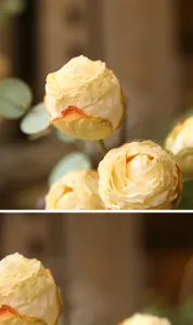 Detailed close-up of artificial vintage burnt-edge silk roses showcasing realistic texture.