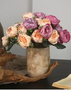 Artificial peony flower bouquet in rustic vase, perfect for home living room decor and dining table.