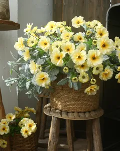 Artificial yellow ranunculus flower bouquet detail for Nordic home decor and table centerpiece