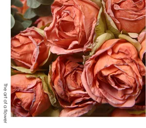 Exquisite artificial rose bouquet close-up, vintage burnt edge style for home table decor art.