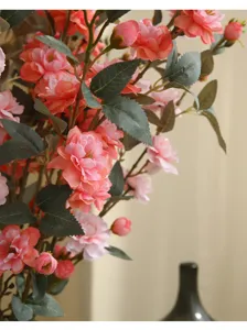 Artificial camellia flower for home decor, wedding arrangement and table centerpiece display.