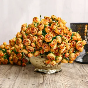 Artificial camellia flower arrangement in ceramic vase, perfect autumn home decor table centerpiece.