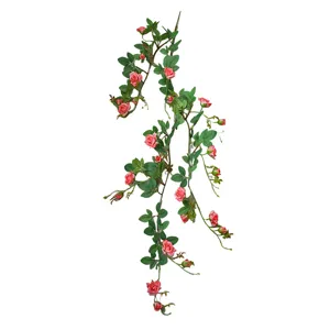 Artificial pink rose flower vine for home wedding decoration and ceiling hanging display.