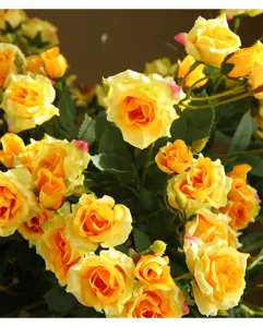 Artificial yellow rose flower arrangement detail, gorgeous bubble rose bouquet for home decor and table.