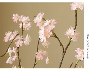 Artificial silk flower branch pink cherry blossom home decor interior detail view