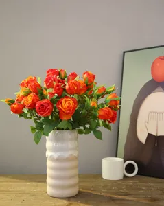 Artificial rose flower bouquet home decor ceramic vase living room table photography prop detail view