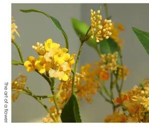 Artificial yellow flower branch, fake floral arrangement for modern home decor and living room.