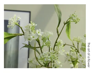 Artificial white sweet alyssum flower branch detail, realistic floral decor for home interior.