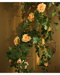 Artificial rose flower vine decor for home wall decoration, fake floral garland rattan hanging plant.
