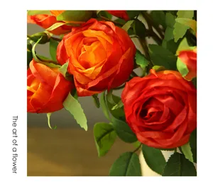 Artificial silk rose flower bouquet close up, vibrant orange petals for home decor.