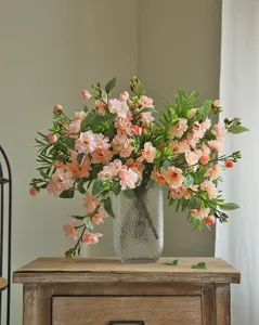 Artificial camellia silk flower bouquet detail, elegant pink floral home decor arrangement