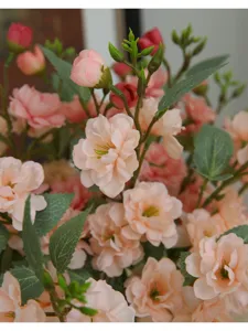 Artificial camellia silk flower bouquet detail, perfect for home and dining table decor.