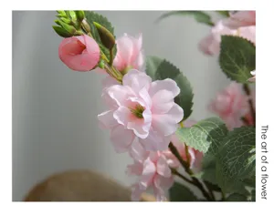 Artificial camellia flower bouquet for home table decoration and chic floral arrangement.
