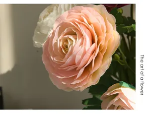 Artificial ranunculus flower detail close-up, pink petal texture for home decor.