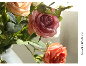 Artificial rose flower arrangement for home decor, beautiful multi-head floral display close-up.