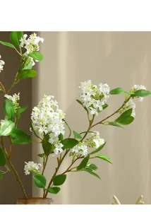 Detailed close-up view of artificial orange jasmine flower branch for home decor.