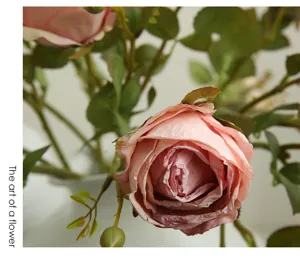 Exquisite artificial vintage rose single branch detail shot, perfect Nordic romantic floral decor.