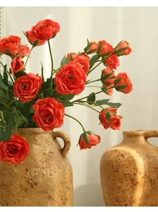 Artificial flower bouquet with vintage ceramic vase for home decor and living room setup