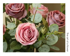 Artificial rose flower arrangement bouquet with eucalyptus leaves for home decor living room.