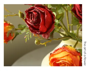 Close-up detail of artificial retro burnt-edge rose flower, elegant floral decor piece.
