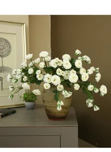 Artificial white peony and rose flower arrangement with ceramic vase for home living room decor.