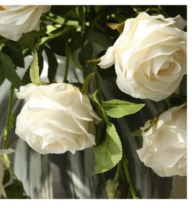 Artificial white rose flower detail shot, perfect for home decor, floral arrangement display.